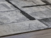 Warmstead Furniture - Ashley Furniture - Brycebourne Rug - 5'3" x 7'7" Rug / Black/Cream/Gray - R404982